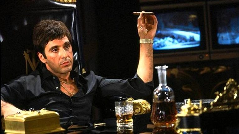 What are some reasons why Scarface might be overrated compared to other gangster films